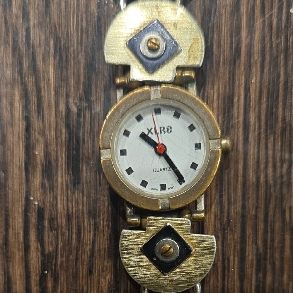 Gold and Black Women's Quartz Watch